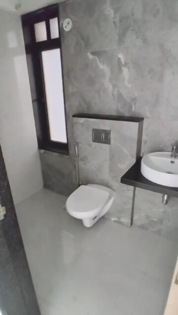 Bathroom in 1 BHK Apartment at MICL Aaradhya Highpark, Mira Road – for Sale