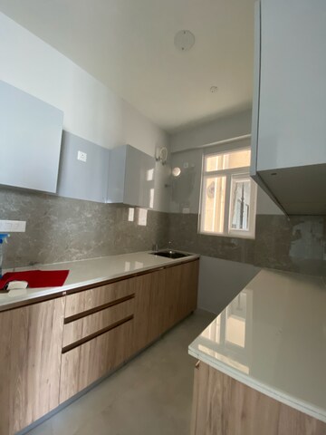 Kitchen in 3 BHK Builder Floor at Signature Global City 93, Sector 93 – for Sale