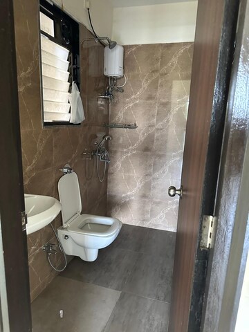 Bathroom in 1 BHK Apartment at UK Iridium, Kandivali East – for Rent