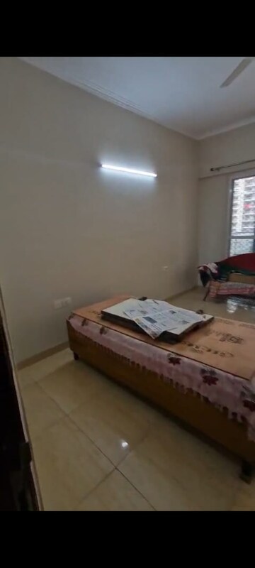 Living Room in 3.5 BHK Apartment at Aims Golf City, Sector 75 – for Rent