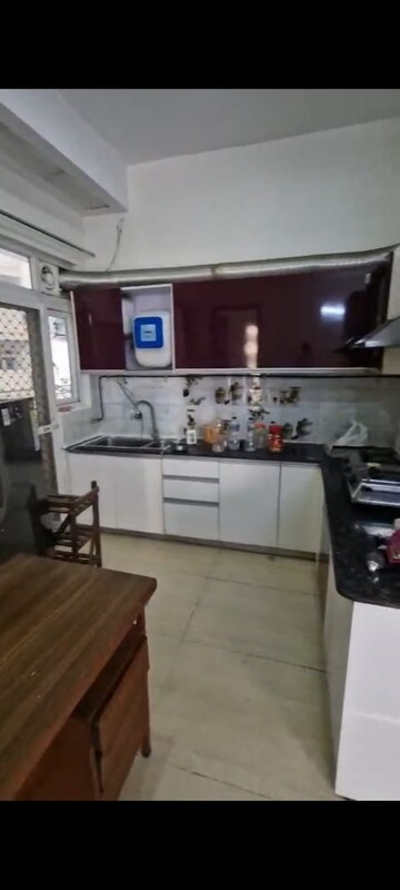 Kitchen in 3.5 BHK Apartment at Aims Golf City, Sector 75 – for Rent