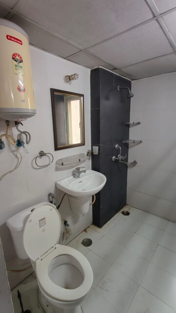 Bathroom in 2 BHK Apartment at Gardenia Golf City, Sector 75 – for Rent