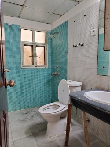 Bathroom in 2 BHK Apartment at Jaipurias Sunrise Greens, Ahinsa Khand 1 – for Rent