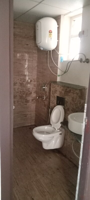 Bathroom in 3 BHK Apartment at Gaur Sportswood, Sector 79 – for Rent