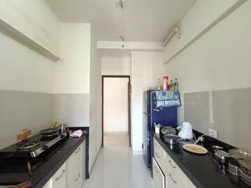 Kitchen in 3 BHK Apartment at Lodha Grandezza, Wagle Industrial Estate – for Sale