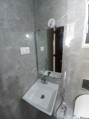 Bathroom in 1.5 BHK Apartment at Dosti Oro 67, Kandivali West – for Rent