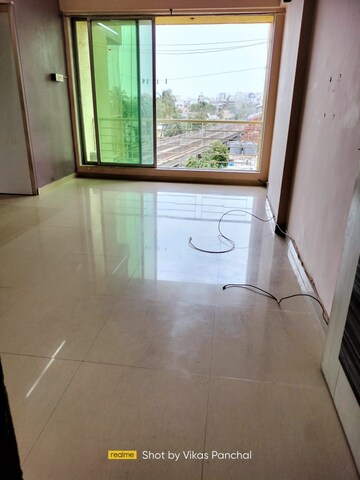Room in 2 BHK Apartment at Ratnakar CHS, Andheri West – for Rent