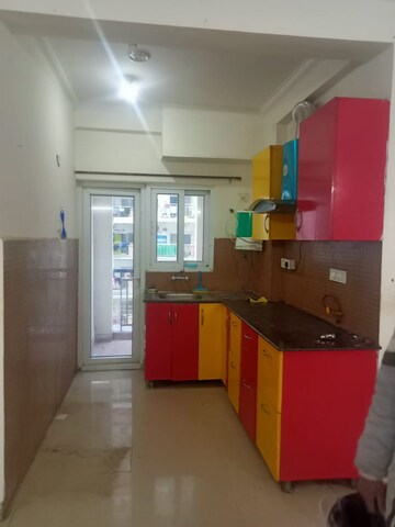 Kitchen in 2 BHK Apartment at Amrapali Silicon City, Sector 76 – for Sale