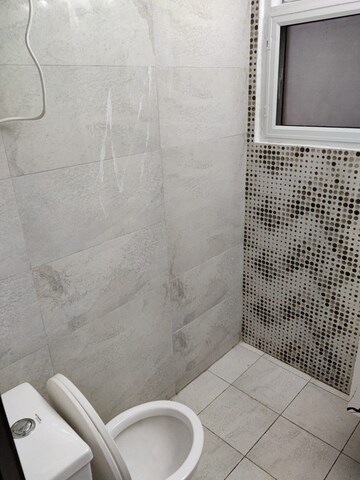Bathroom in 2 BHK Apartment at Amrapali Silicon City, Sector 76 – for Sale
