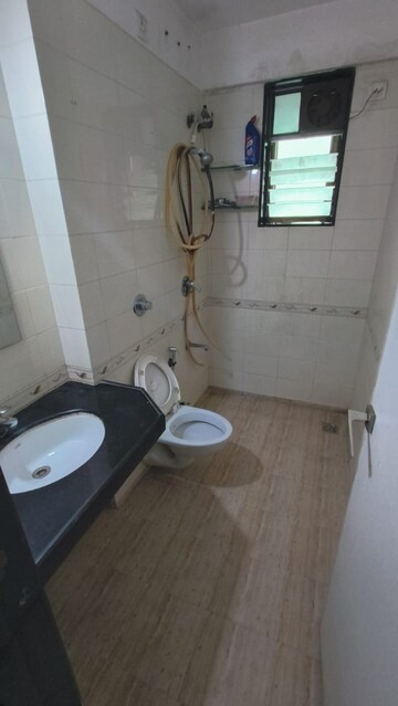 Bathroom in 3 BHK Apartment at Bhartiya Rakshak Adhikari CHS, Andheri West – for Rent