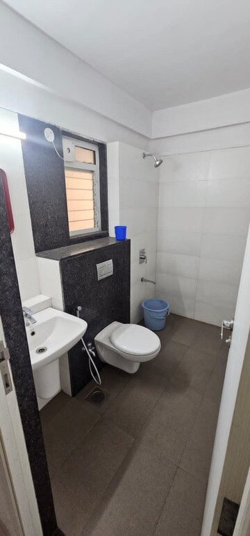 Bathroom in 2 BHK Apartment at Rustomjee Urbania Aurelia, Majiwada – for Rent