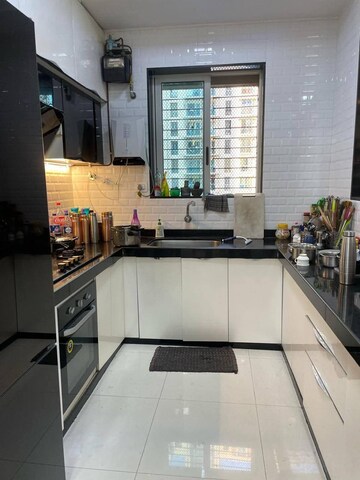 Kitchen in 3 BHK Apartment at Sheth Vasant Lawns, Laxmi Nagar – for Rent