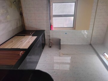Kitchen in 1 BHK Apartment at Ramdevi CHS, Khar West – for Rent