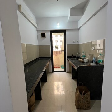 Kitchen in 1.5 BHK Apartment at Lodha Palava Fontana C To H, Taloja Bypass Road – for Rent