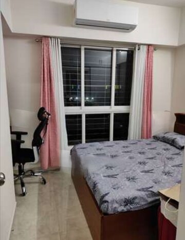 Bedroom in 2 BHK Apartment at Lodha Amara, Kolshet Road – for Rent