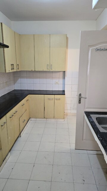 Kitchen in 2 BHK Apartment at Unitech The Residences Gurgaon, Sector 33 – for Rent