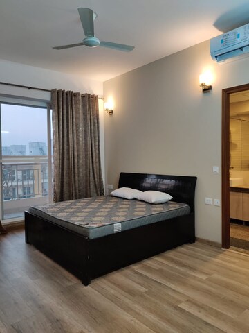 Bedroom in 3.5 BHK Apartment at Aims Golf City, Sector 75 – for Rent