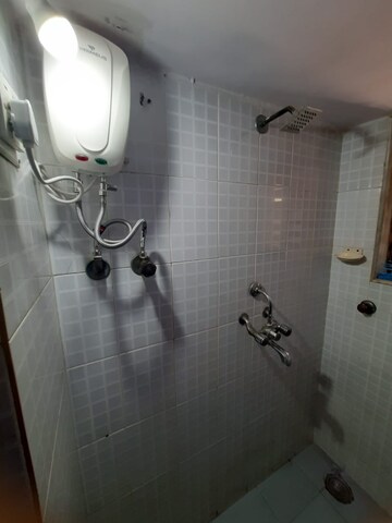 Bathroom in 1 BHK Apartment at Yamuna Villa, Andheri West – for Rent