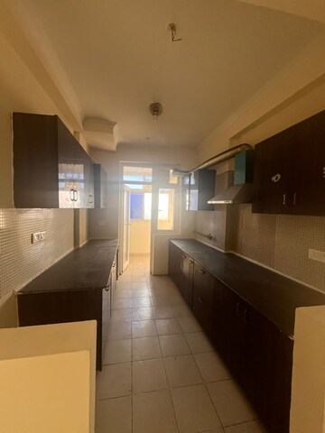Kitchen in 3 BHK Apartment at Amrapali Silicon City, Sector 76 – for Rent