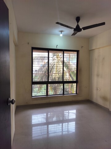 Room in 2 BHK Apartment at Mulund East – for Rent