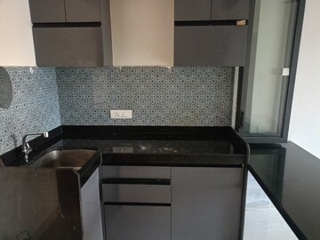 Kitchen in 1 BHK Apartment at Lodha Quality Home Tower 2, Majiwada – for Rent