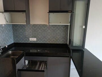 Kitchen in 1 BHK Apartment at Lodha Quality Home Tower 2, Majiwada – for Rent