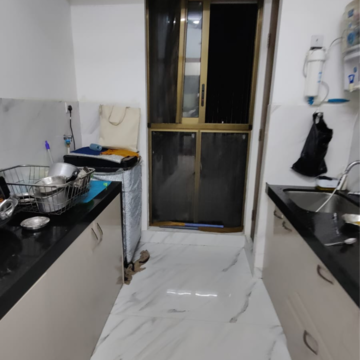 Kitchen in 2 BHK Apartment at Raymond Ten X Habitat, Swastik Garden – for Sale
