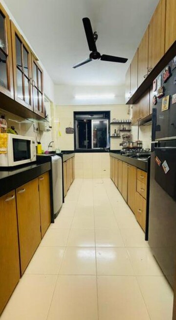Kitchen in 2 BHK Apartment at Raheja Classique, Andheri West – for Rent
