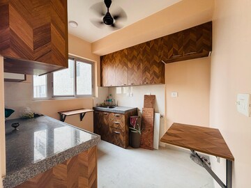 Kitchen in 2 BHK Apartment at Piramal Vaikunth, Balkum Pada – for Rent