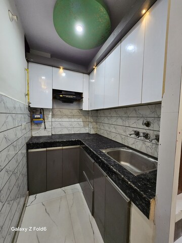 Kitchen in 2 BHK Builder Floor at Raja Puri – for Sale