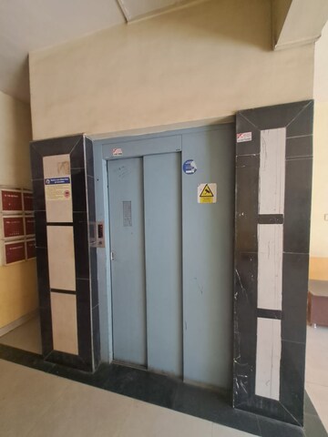 Building Lobby in 2 BHK Apartment at Runwal Prestige, Yerawada – for Rent