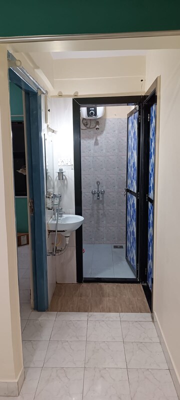 Bathroom in 1 BHK Apartment at Rajnigandha CHS Vasant Vihar, Vasant Vihar – for Rent