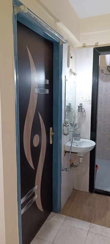 Bathroom in 1 BHK Apartment at Rajnigandha CHS Vasant Vihar, Vasant Vihar – for Rent