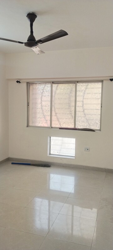 Bedroom in 2 BHK Apartment at Nirmal Lifestyle Residency CHS Ltd, Mulund West – for Sale
