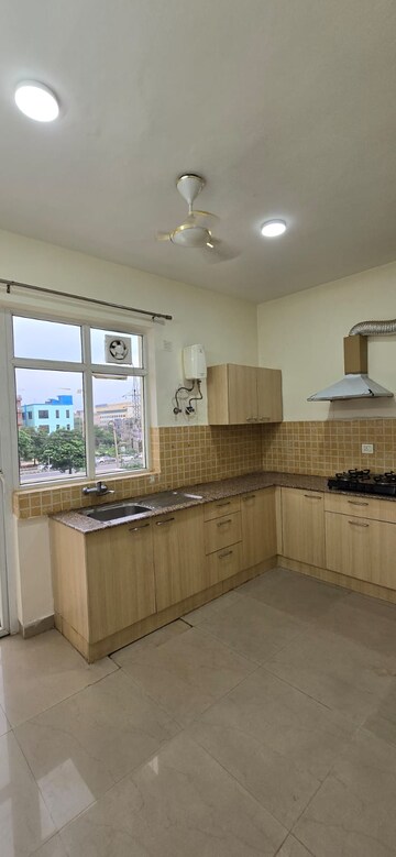 Kitchen in 3.5 BHK Builder Floor at Orchid Island, Sector 51 – for Rent