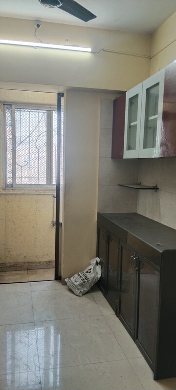 Kitchen in 2 BHK Apartment at Laxmi Royal Classic, Mulund West – for Rent