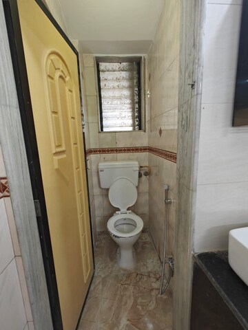 Bathroom in 1 BHK Apartment at Namaskar Apartment, Santacruz East – for Rent
