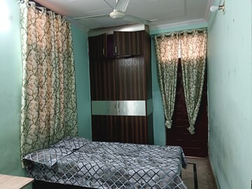 Bedroom in 2 BHK Builder Floor at Nirman Vihar – for Rent