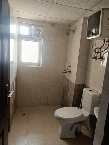 Bathroom in 3 BHK Apartment at Gardenia Golf City, Sector 75 – for Rent