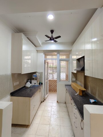 Kitchen in 3 BHK Apartment at Amrapali Silicon City, Sector 76 – for Rent