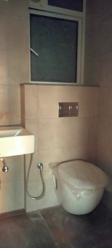 Bathroom in 1 BHK Apartment at Shapoorji Pallonji Siennaa Wing A, Kandivali East – for Rent