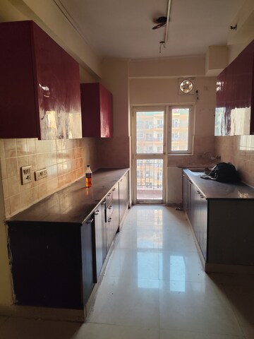 Kitchen in 2.5 BHK Apartment at Aims Golf City, Sector 75 – for Rent