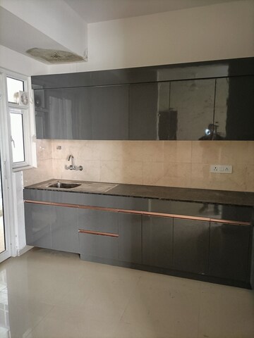 Kitchen in 3 BHK Apartment at Rishita Manhattan, Gomti Nagar – for Rent
