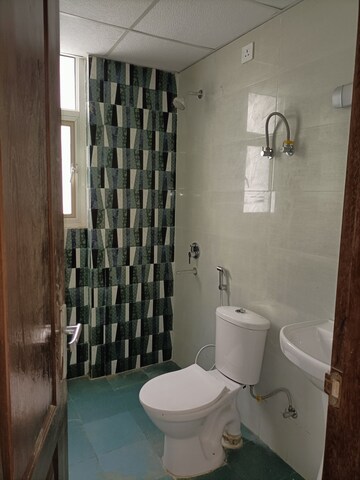 Bathroom in 3 BHK Apartment at Rishita Manhattan, Gomti Nagar – for Rent