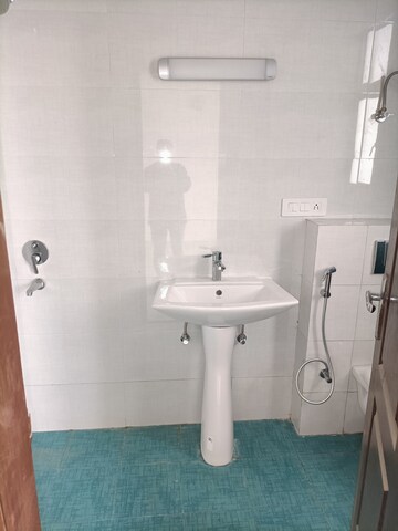Bathroom in 3 BHK Apartment at Rishita Manhattan, Gomti Nagar – for Rent