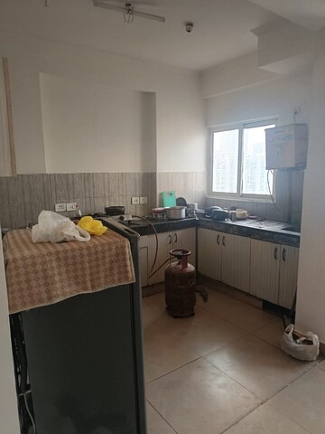 Kitchen in 2 BHK Apartment at Amrapali Silicon City, Sector 76 – for Rent
