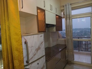 Kitchen in 2 BHK Apartment at Suncity Avenue 76, Sector 76 – for Rent