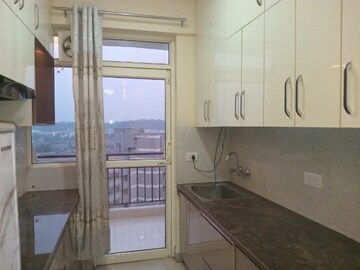 Kitchen in 2 BHK Apartment at Suncity Avenue 76, Sector 76 – for Rent