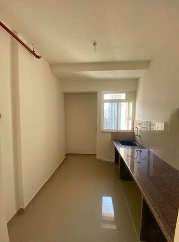 Kitchen in 1 BHK Apartment at Puranik Hometown, Ghodbunder Road – for Rent
