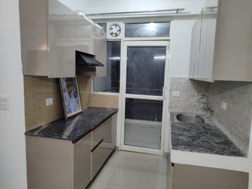 Kitchen in 2 BHK Apartment at Suncity Avenue 76, Sector 76 – for Rent
